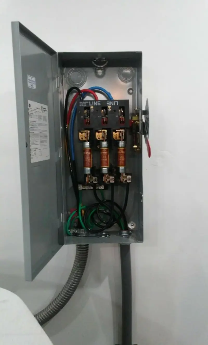 Three-phase disconnect switch installed for Smoke Detector Installation in Bennington